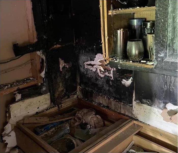 Burnt appliance and soot damage