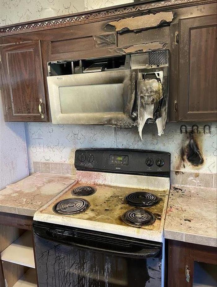 Melting Microwave from fire
